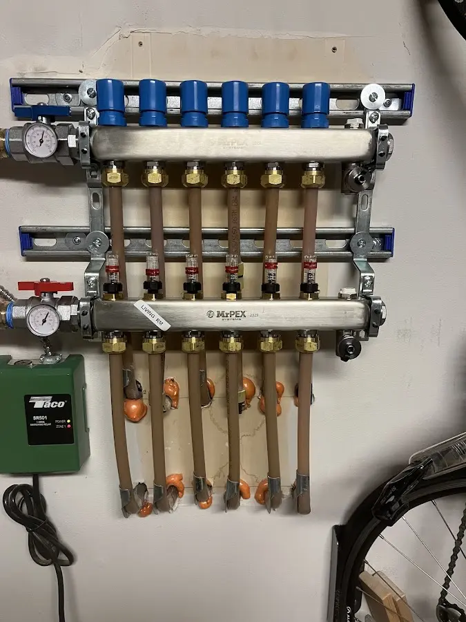 Plumber performing Gas Line Installation at a residential property in Angels